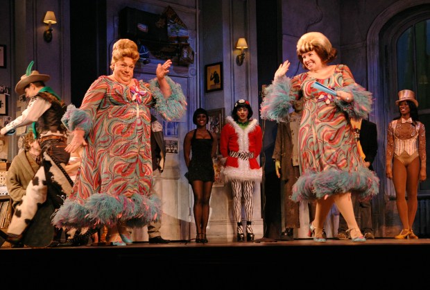 Hairspray cast members George Wendt, left, and Shannon Durig perform on stage during a free concert on Nov. 30, 2007, in New York. (Louis Lanzano/AP)