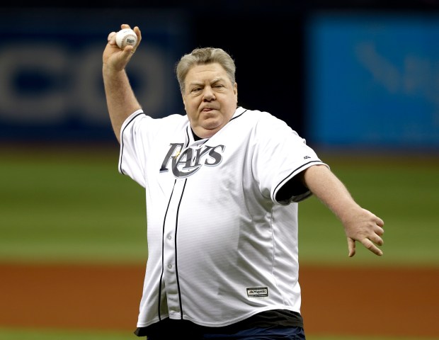 Actor George Wendt throws out the ceremonial first pitch before a baseball game between the Tampa Bay Rays and the Toronto Blue Jays on April 3, 2016, in St. Petersburg, Florida. (Chris O'Meara/AP)