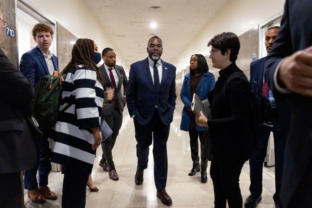 Mayor Brandon Johnson departs with staff members after a meeting with Gov. JB Pritzker at the Stratton Building next door to the Illinois State Capitol on April 30, 2025, in Springfield. (Brian Cassella/Chicago Tribune)