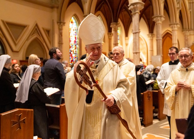 Cardinal Blase Cupich, archbishop of Chicago, greets people at the end of a memorial Mass for Pope Francis on April 23, 2025, at Holy Name Cathedral. (Brian Cassella/Chicago Tribune)
