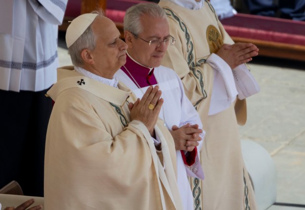Pope Leo XIV reacts after receiving the fisherman's ring during his installation Mass in St. Peter's Square on May 18, 2025, at the Vatican. (Brian Cassella/Chicago Tribune)