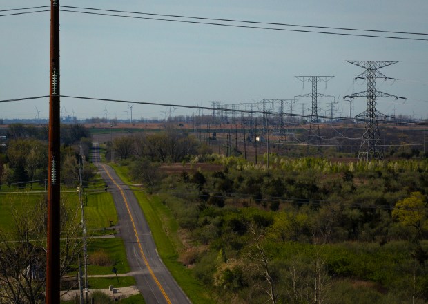 The view looking south along East 2659 that divides the MISO and PJM power grids in Marseilles on April 23, 2025. (E. Jason Wambsgans/Chicago Tribune)