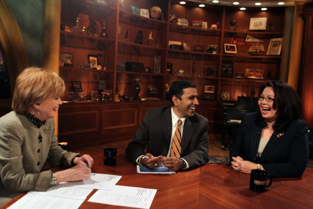 Then Illinois' 8th congressional district democratic candidates Raja Krishnamoorthi, center, and Tammy Duckworth, right, laugh with WTTW's Carol Marin prior to a debate on March 7, 2012. (Chris Sweda/ Chicago Tribune)