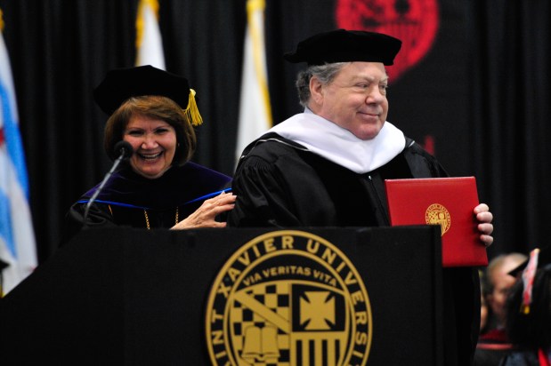 George Wendt, who took summer classes at Saint Xavier when he lived in Beverly, receives an honorary degree at the Saint Xavier graduation ceremony on May 7, 2016, in Chicago. (Gary Middendorf/Chicago Tribune)