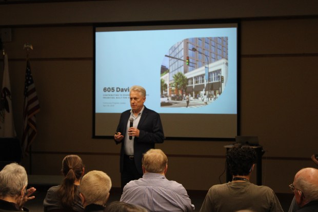 Vermilion Development Group's Managing Director Kerry Dickson speaking at a community meeting for a proposed 31-story building at 605 Davis Street at the Evanston Public Library. (Richard Requena/Pioneer Press)