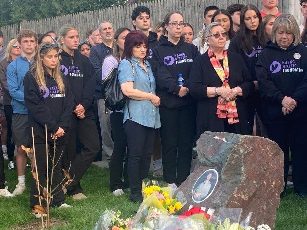 A crowd of more than 200 people gathered along East Lake Avenue and Meadow Lane in Glenview on May 12, 2025 to mark the one-year anniversary of the death of 17-year-old Marko Niketic in a car crash. (Jennifer Johnson/for Pioneer Press)