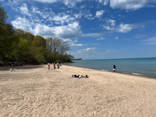 Lighthouse Beach in Evanston opens for swimming on May 24, but visitors took advantage of temperatures in the 70s last week. (Phil Rockrohr/for Pioneer Press)