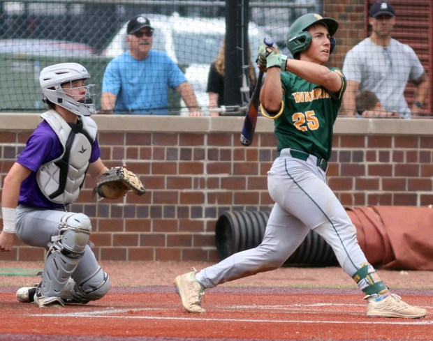 Waubonsie Valley's Shane Torres watches the ball hit to right during the Class 4A Sectional baseball game against Downers Grove North in Lockport on Saturday, June. 7, 2025. (James C. Svehla / for the Beacon-News)