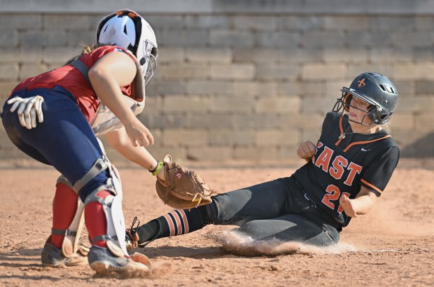 St. Charles East's Hayden Sujack (21) scores during the 6th inning of Friday's IHSA Class 4A Fremd Sectional Championship against South Elgin, June, 6, 2025. St. Charles East won the game, 5-0. (Brian O'Mahoney for the The Beacon-News)