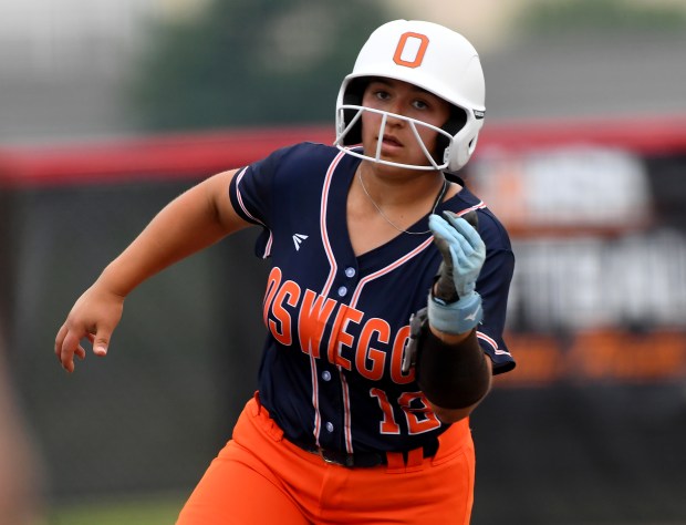 Oswego's Aubriella Garza (12) rounds third on the way to home. Oswego defeated Oak Park River Forest 13-2 at the Louisville Slugger Sports Complex in Peoria, Class 4A state semifinals, Friday, June 13, 2025. (Rob Dicker / for the Beacon News)
