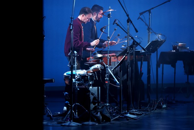 Third Coast Percussion members David Skidmore and Peter Martin perform with the street dance team Movement Art at the Harris Theater in Chicago on May 2, 2023. (Chris Sweda/Chicago Tribune)