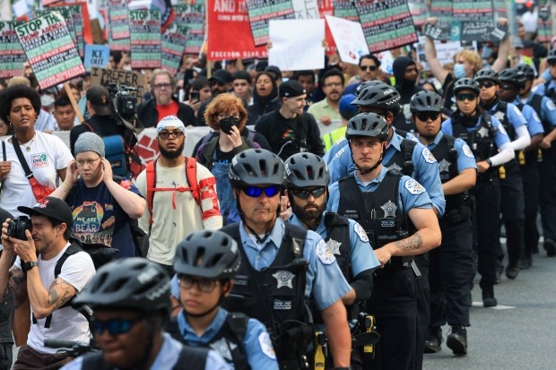 Demonstrators march to protest nationwide immigration raids by federal law enforcement on June 12, 2025, in Chicago. (John J. Kim/Chicago Tribune)