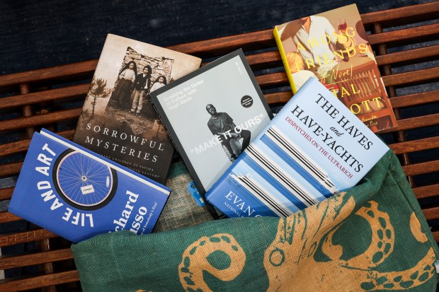 "Life and Art" by Richard Russo, "Sorrowful Mysteries: The Shepherd Children of Fatima and the Fate of the Twentieth Century" by Stephen Harrigan, "Make It Ours: Crashing the Gates of Culture with Virgil Abloh" by Robin Givhan, "Among Friends" by Hal Ebbott, and "The Haves and Have-Yachts: Dispatches on the Ultrarich" by Evans Osnos. (Stacey Wescott/Chicago Tribune)