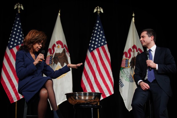Then Democratic presidential candidate Pete Buttigieg chats with retired NBC-5 reporter Renee Ferguson at Corliss High School in the Pullman neighborhood, Jan. 17, 2020. (E. Jason Wambsgans/Chicago Tribune)