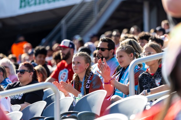 Stars fans clap after a play against the Seattle Reign during a doubleheader that also featured the Fire on Saturday, June 14, 2025, at Solder Field. (Vincent D. Johnson/for the Chicago Tribune)