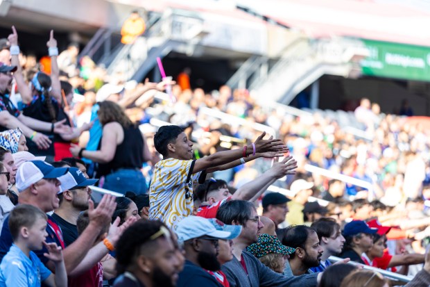 Stars fans react, wanting the referee to make a call against the Seattle Reign, during a doubleheader that also featured the Fire on Saturday, June 14, 2025, at Solder Field. (Vincent D. Johnson/for the Chicago Tribune)