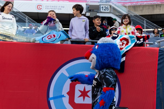 Young fans interact with Stars mascot Supernova on Saturday, June 14, 2025, at Solder Field. (Vincent D. Johnson/for the Chicago Tribune)