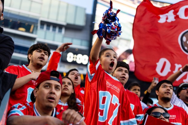 A young Fire fan gets excited during a game against Nashville on Saturday, June 14, 2025, at Solder Field. (Vincent D. Johnson/for the Chicago Tribune)