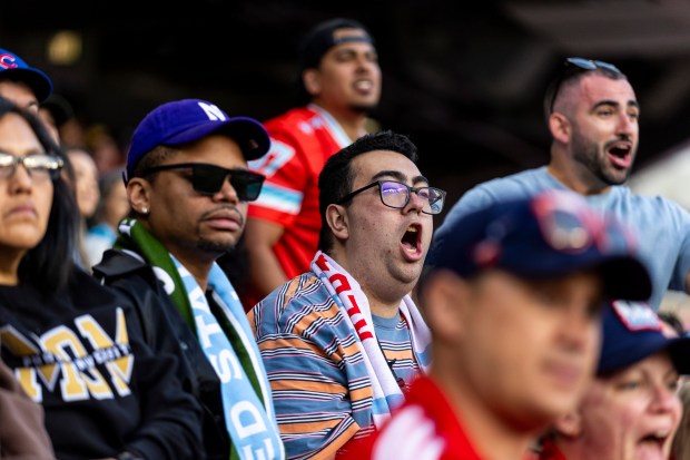 Fire fan Tyler Compoz, center, yells for what he thought should have been a penalty against Nashville on Saturday, June 14, 2025, at Solder Field. (Vincent D. Johnson/for the Chicago Tribune)