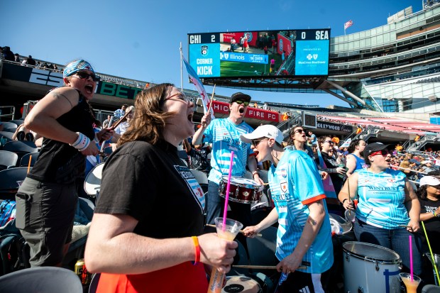 Members of the Chicago 134 support group, from left, Stef Hare, Grace Cotter, Pete Tanner and Courtney Stegenga, bang on drums as the Stars play the Seattle Reign on Saturday, June 14, 2025, at Solder Field. (Vincent D. Johnson/for the Chicago Tribune)