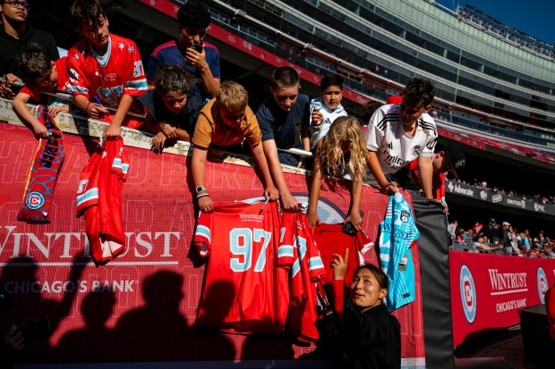Manaka Hayashi of the Stars signs jerseys after a game against the Seattle Reign on Saturday, June 14, 2025, at Solder Field. (Vincent D. Johnson/for the Chicago Tribune)