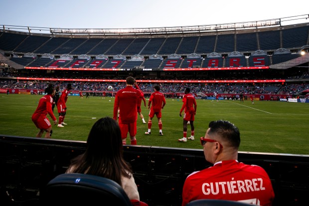 Fire fans watch as the team warms up before a game against Nashville on Saturday, June 14, 2025, at Solder Field. (Vincent D. Johnson/for the Chicago Tribune)