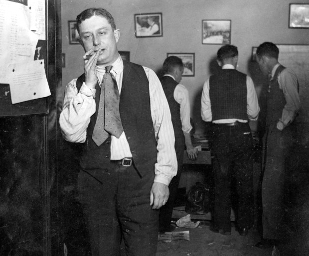 Alfred "Jake" Lingle, 38, an 18-year-veteran Chicago Tribune crime reporter was shot on June 9, 1930 in the tunnel under Michigan Avenue leading to the Illinois Central train station at Randolph Street. Lingle, who was killed by a single gun shot to his head, had been covering Chicago's underworld for years and had come to know local gang leaders. He died clutching a copy of the Racing Form. Many reports suggest that Lingle was not killed to prevent the exposure of gang activity, but that he was involved in a gang and violated a code. (Chicago Tribune historical photo)