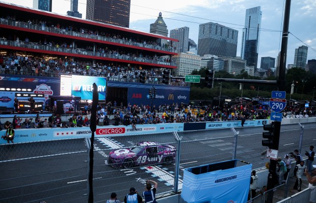 Alex Bowman finishes his victory lap after winning the NASCAR Chicago Street Race in Grant Park on July 7, 2024. (Eileen T. Meslar/Chicago Tribune)