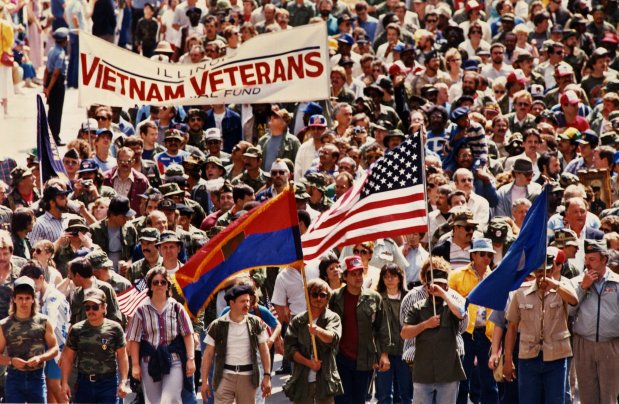 Eleven years after the war ended, 200,000 Vietnam veterans finally got a chance to proudly display their colors during the Vietnam Veterans Welcome Home parade on June 13, 1986, in Chicago. (Anne Cusack/Chicago Tribune)