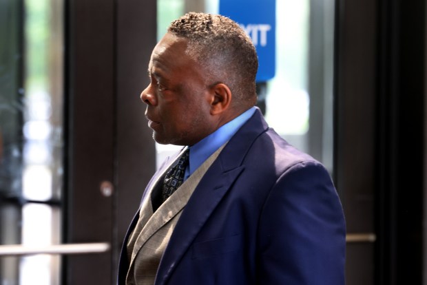 Police Officer Craig Lancaster arrives at the Dirksen Courthouse in Chicago, Thursday, June 12, 2025, for possible plea, to misdemeanor battery for striking an eighth grader. (Antonio Perez/Chicago Tribune)