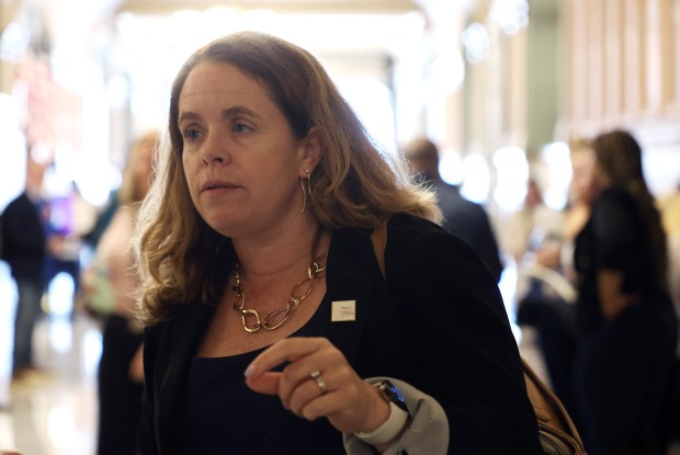 State Rep. Maura Hirschauer talks with a reporter outside a House hearing room during a caucus at the Illinois State Capitol on May 29, 2025, in Springfield. (John J. Kim/Chicago Tribune)