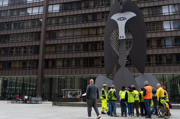 Volunteers congregate in Daley Plaza hours prior to the 'No Kings' protest in downtown Chicago on June 14, 2025. (Audrey Richardson/Chicago Tribune)