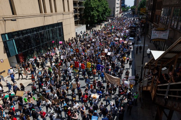 Thousands of people attend a "No Kings" rally in the Loop Saturday June 14, 2025, in Chicago. The rally started around noon in Daley Plaza. (Armando L. Sanchez/Chicago Tribune)