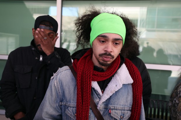Malik Wilson talks about the stabbing death of his sister Teone Jones and injuries to his nephews outside Comer Children's Hospital in Chicago on Feb. 21, 2025. (Terrence Antonio James/Chicago Tribune)