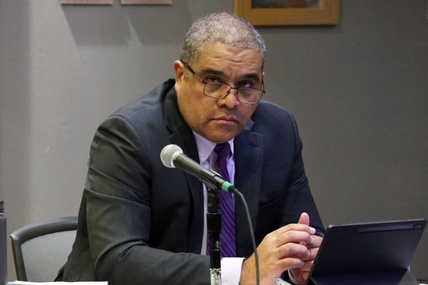 Alfonso Carmona, chief portfolio officer for Chicago Public Schools, is seen during a public hearing at the downtown Chicago office of the Illinois State Board of Education regarding an appeal by Urban Prep Academies to keep their charters on Jan. 19, 2023. (Terrence Antonio James/Chicago Tribune)