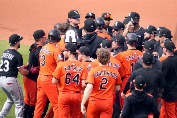 Benches clear after Coly Mayo #16 of the Baltimore Orioles and Lenyn Sosa #50 of the Chicago White Sox exchange pushes after a run down in the fourth inning during a baseball game at Oriole Park at Camden Yards on May 31, 2025 in Baltimore, Maryland. (Photo by Mitchell Layton/Getty Images)