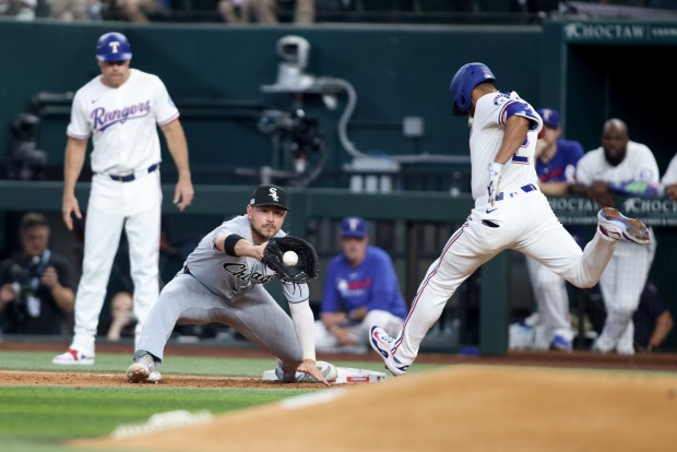 White Sox first baseman Ryan Noda makes the putout on Rangers second baseman Marcus Semien during the first inning on Saturday, June 14, 2025, at Globe Life Field in Arlington, Texas. (Tim Heitman/Getty Images)