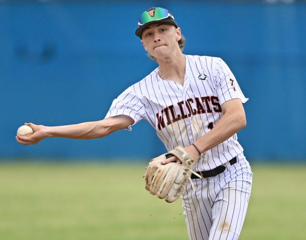 Libertyville shortstop Cole Lockwood throws the ball