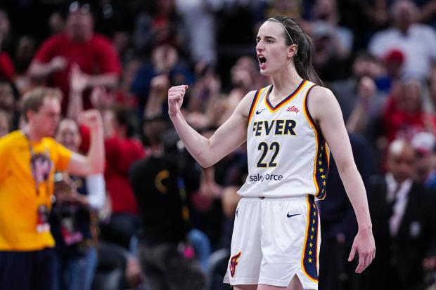Fever guard Caitlin Clark reacts after a basket against the Liberty on May 24, 2025, in Indianapolis. (AP Photo/Michael Conroy)