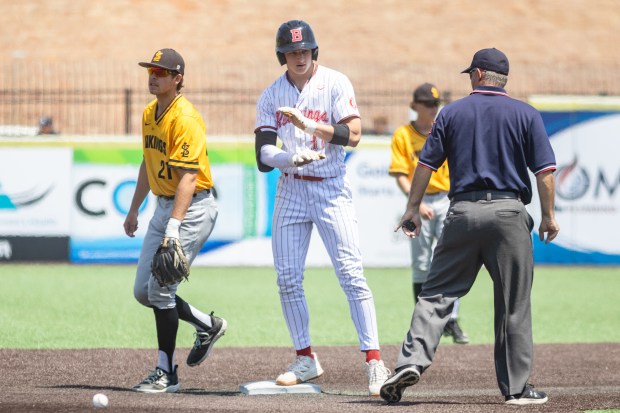Benet's Luke Wildes stands on second base after hitting a double