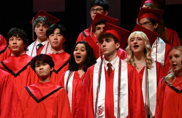 The BHS Choir seniors perform at Barrington High School graduation at Willow Creek Community Church in South Barrington on May 30, 2025. (Karie Angell Luc/Pioneer Press)