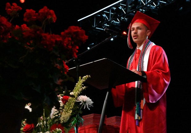 Jonathan Curbelo of Barrington offers the senior speech at the Barrington High School graduation at Willow Creek Community Church in South Barrington on May 30, 2025. (Karie Angell Luc/Pioneer Press)