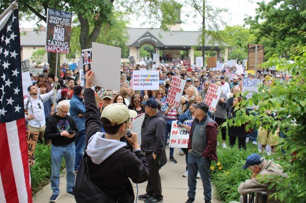 The Highland Park event included speakers, rally co-host, Highland Park resident and climate change activist, Anita Goldberg, State Representative for Highland Park, Bob Morgan, and executive director of ACLU Illinois, Colleen Connell. (Gina Grillo/ for the Pioneer Press)