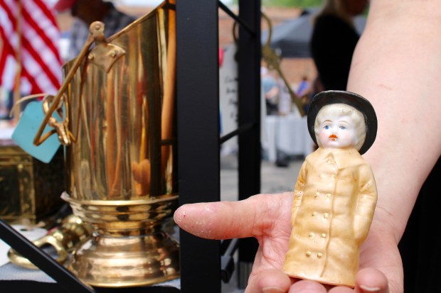 Kerri and Kim Kilpatrick of Palatine are trying to sell off antique items held in their mother's estate, like this salt shaker, one of the many treasures she had collected. (Gina Grillo/ for the Pioneer Press)
