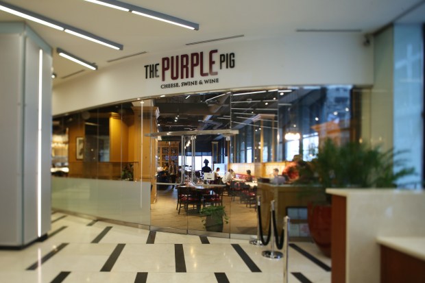 Main entrance at the Purple Pig, 444 N. Michigan Ave., is pictured in 2020. The owners of The Purple Pig plan to open a new restaurant in Oak Brook. (John J. Kim/Chicago Tribune)