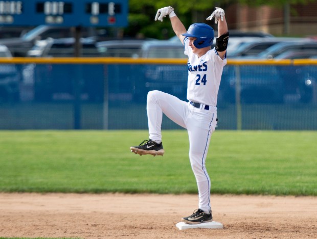 Boone Grove's Tristan Wilson reacts after hitting a double