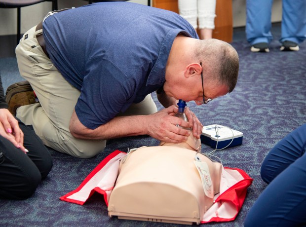 Porter County emergency response coordinator John Pisowicz performs CPR during an emergency preparedness drill at the Porter County Administration building on Wednesday, June 4, 2025. (Michael Gard/for the Post-Tribune)