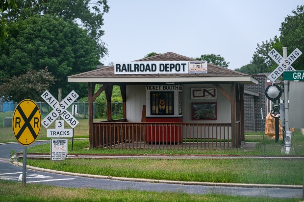 A mock railroad depot sits among simulated train crossings in the Tri-Town Safety Village campus in Schererville on Wednesday, June 11, 2025. (Kyle Telechan/for the Post-Tribune)