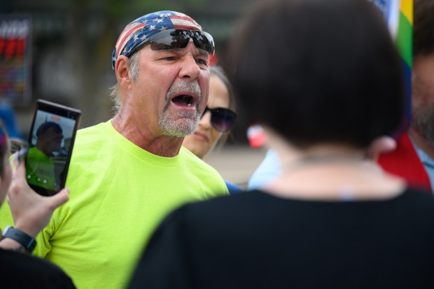 A counter-protester shouts anti-LGBTQ+ slurs at protesters during the NWI Activists "Ban Fascists Not Books" event in downtown Valparaiso on Friday, June 13, 2025. (Kyle Telechan/for the Post-Tribune)
