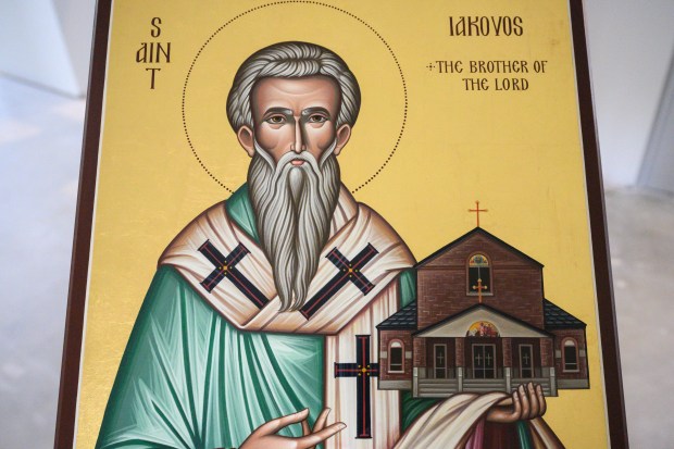 An image painted by iconographer Kenneth Dowdy of St. Iakovos holding the newly-constructed St. Iakovos Greek Orthodox Church sits in the entryway of the newly-opened sanctuary on Saturday, June 14, 2025. (Kyle Telechan/for the Post-Tribune)